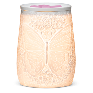 flight of the monarch scentsy warmer glowing on